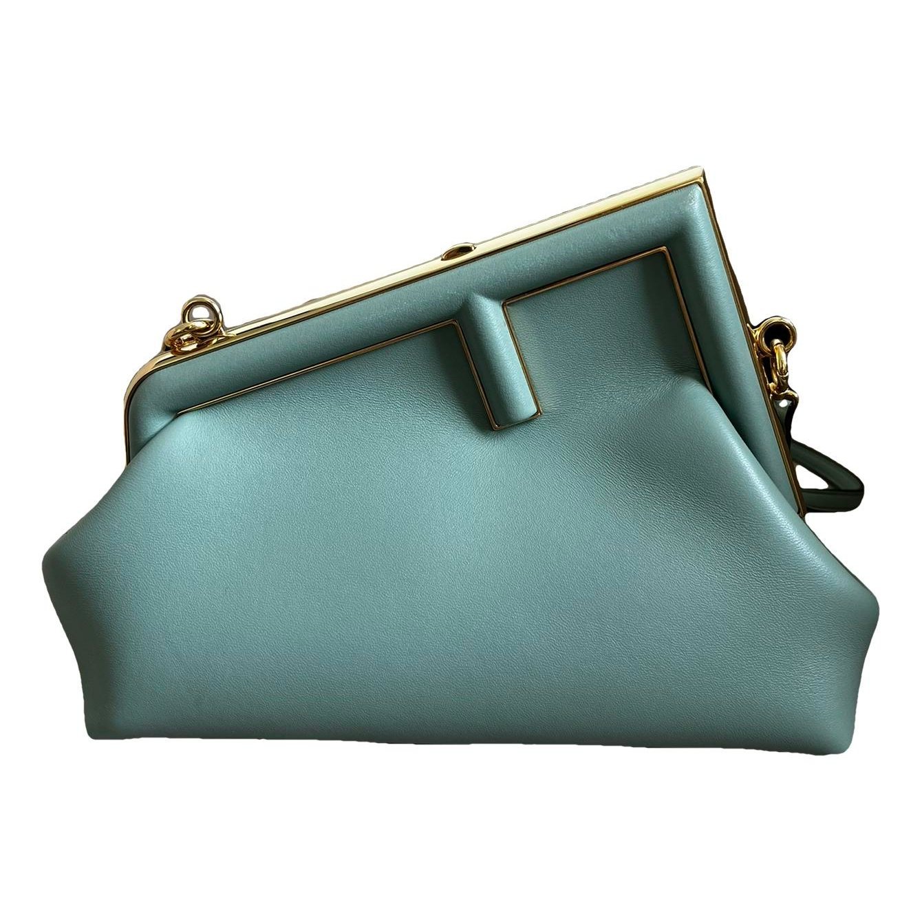 First leather handbag