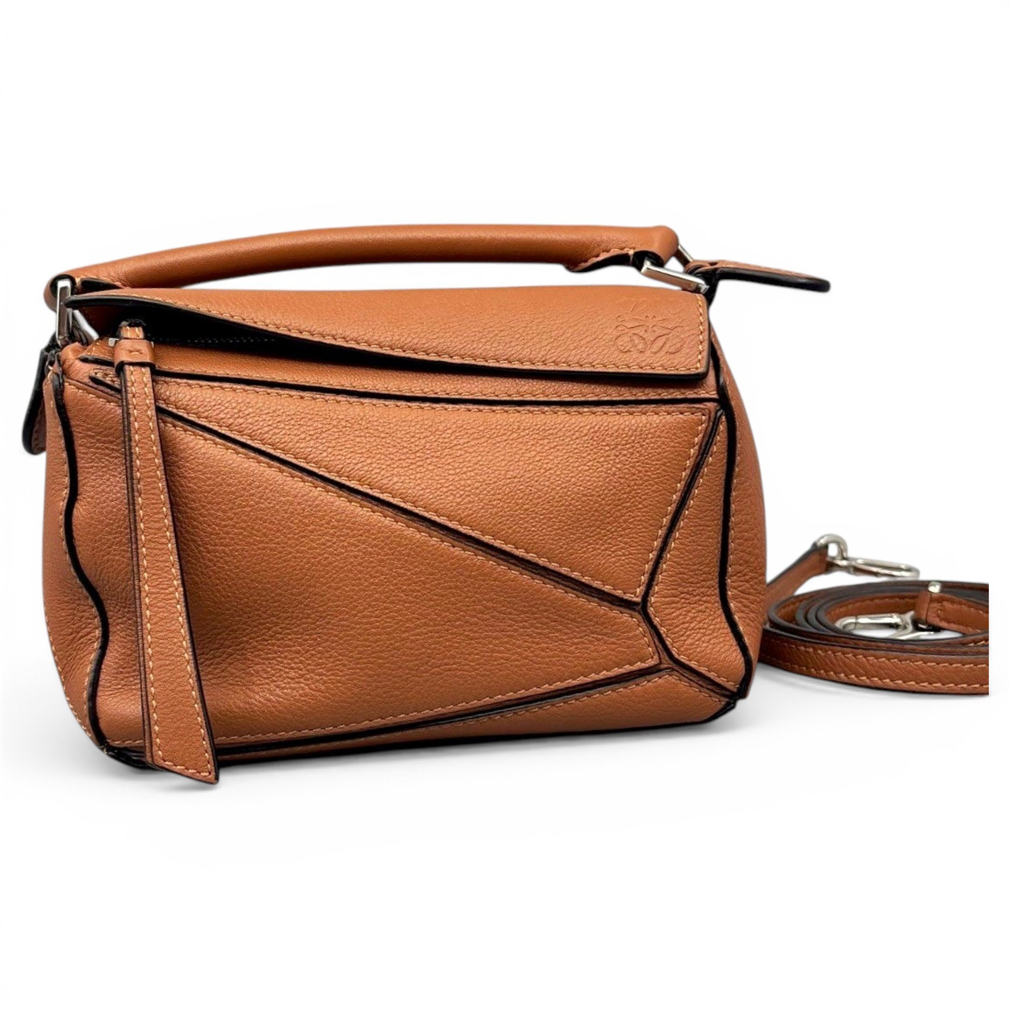 Puzzle leather handbag