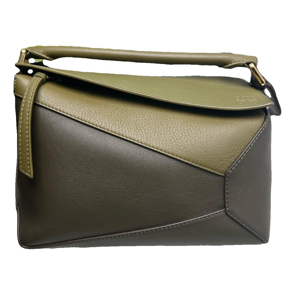 Puzzle leather handbag