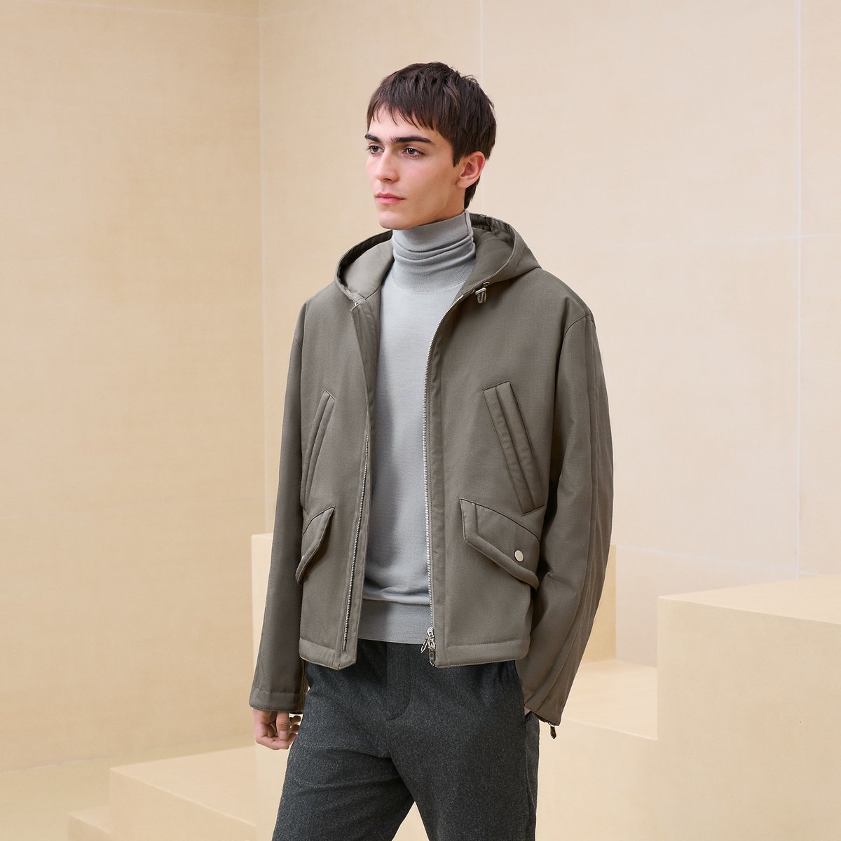 Hooded jacket with bridle detail