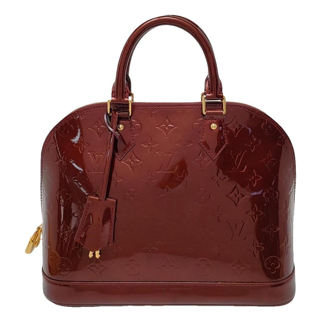Alma patent leather handbag