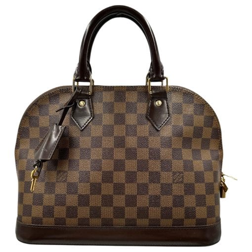 Louis Vuitton Alma cloth handbag