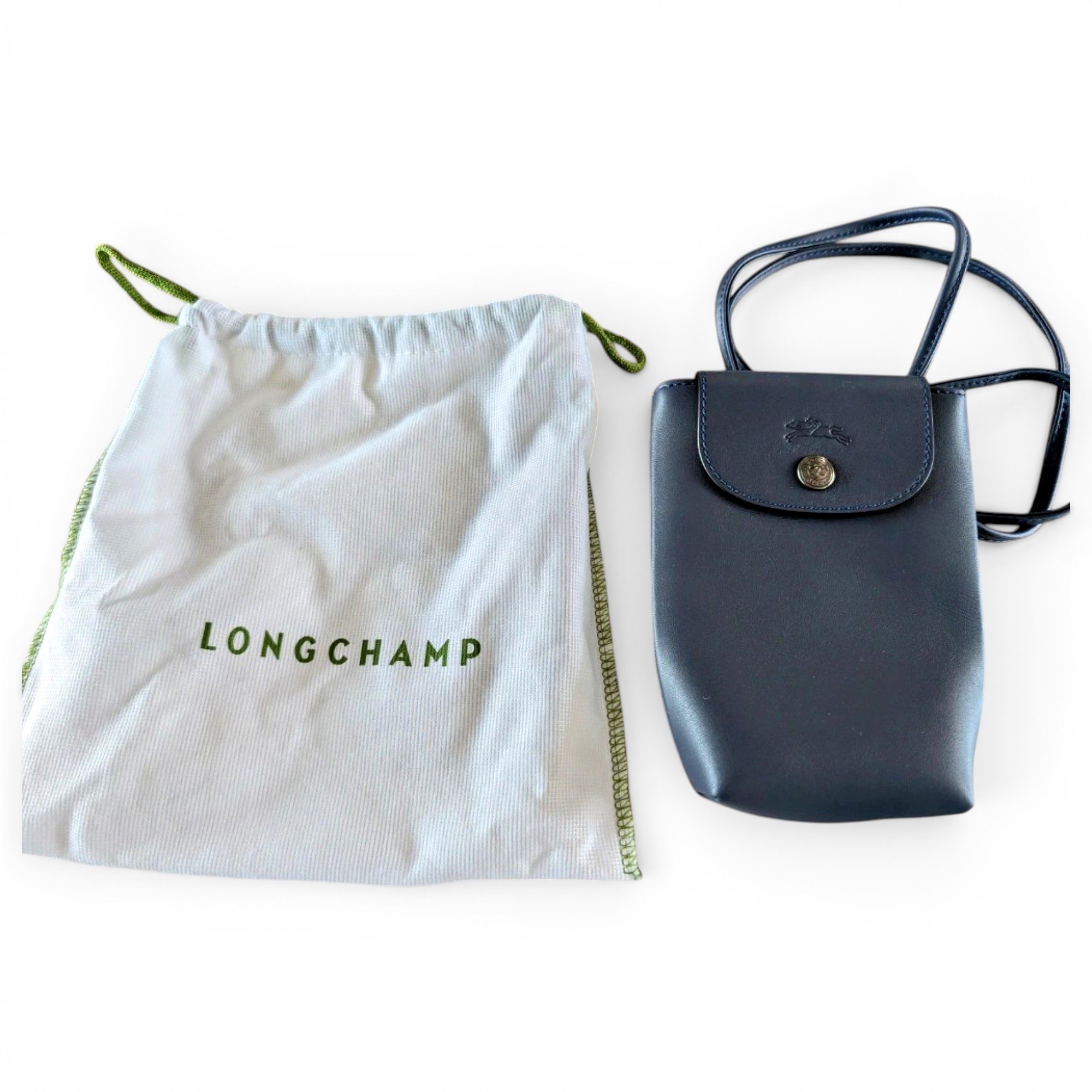 Pliage leather clutch bag