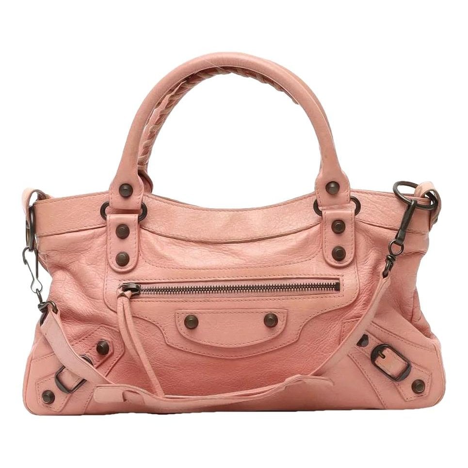 First leather handbag
