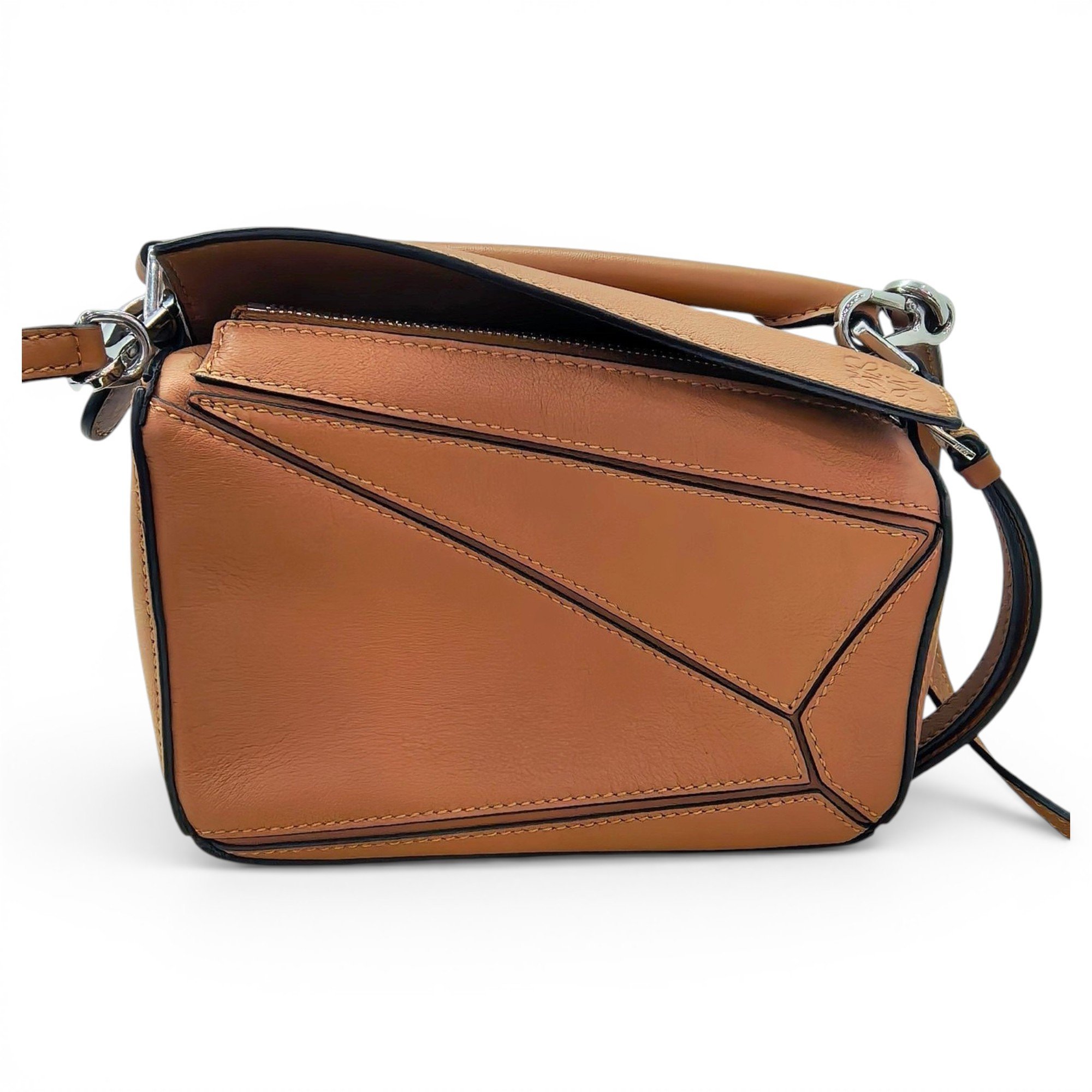 Puzzle leather handbag
