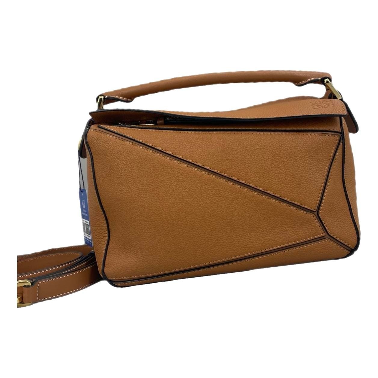 Puzzle leather handbag