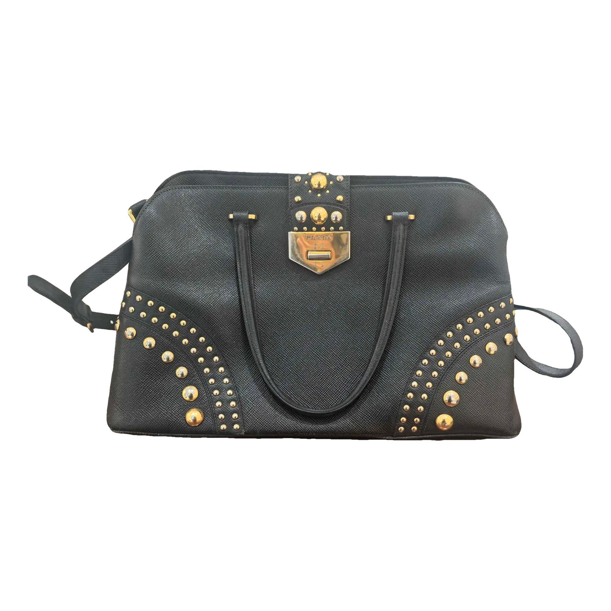 Buckle leather handbag