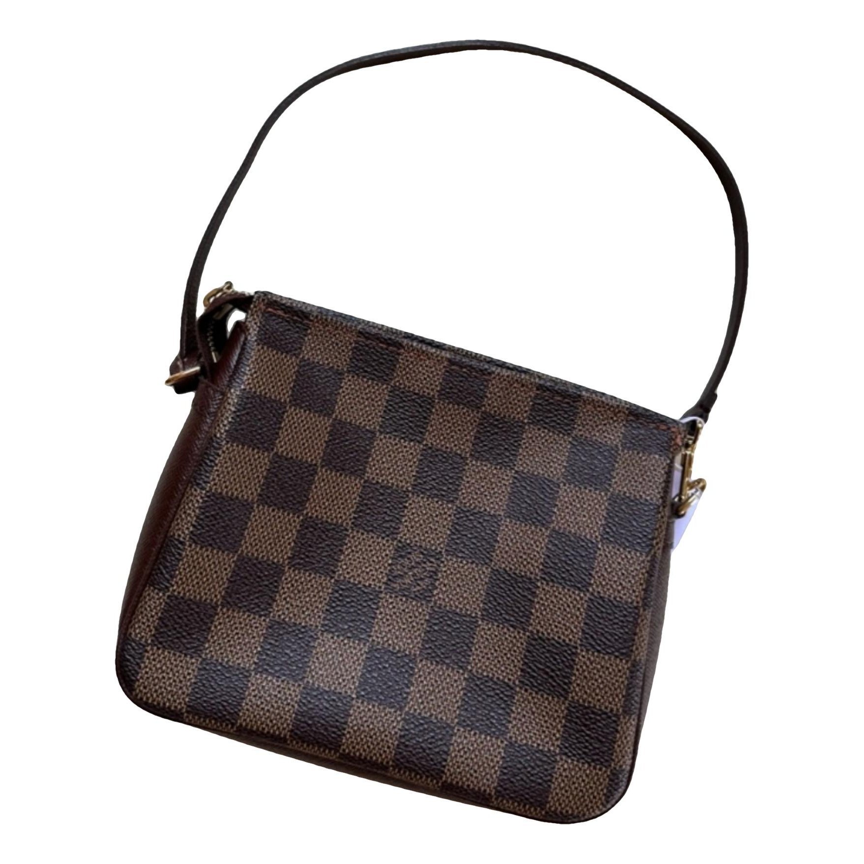 Pochette Accessoire patent leather handbag