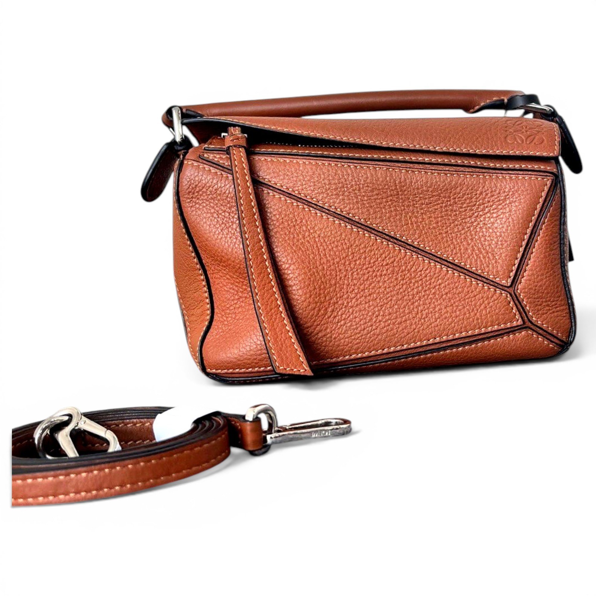 Puzzle leather handbag
