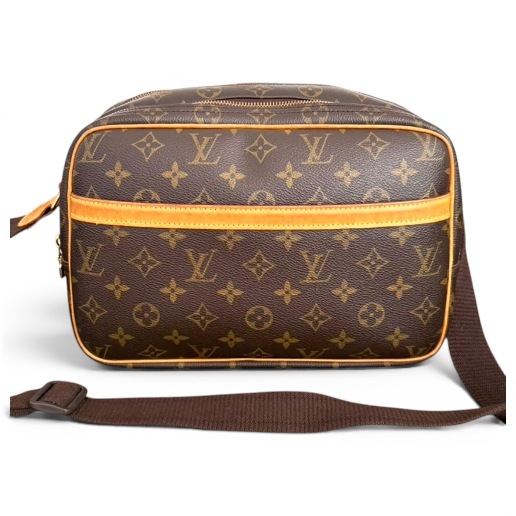 Reporter patent leather handbag