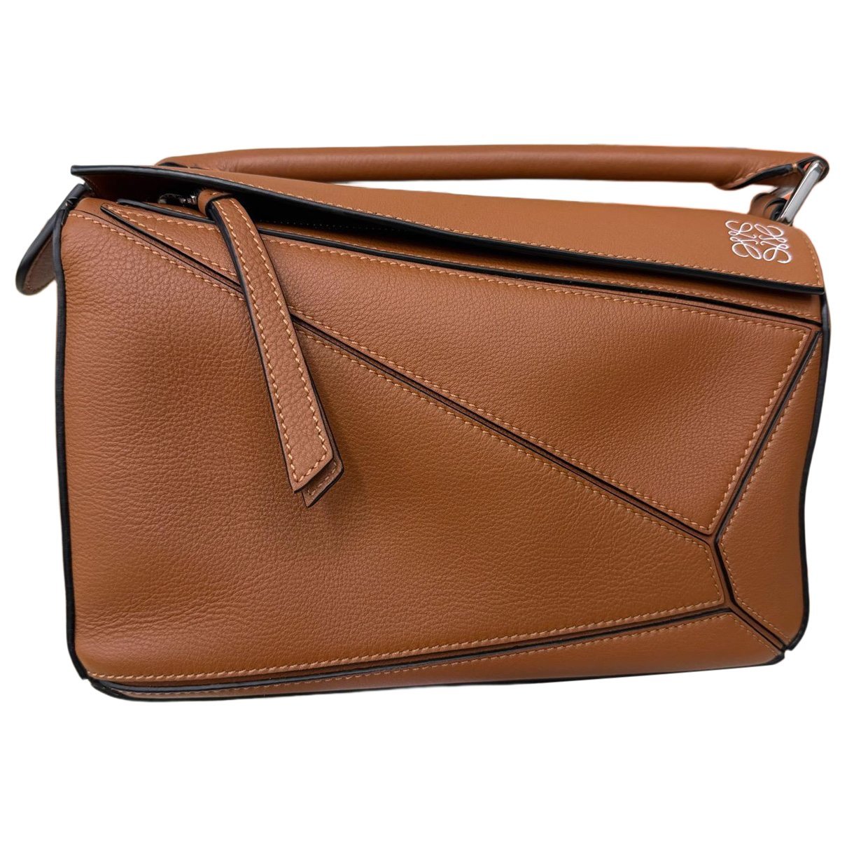 Puzzle leather handbag
