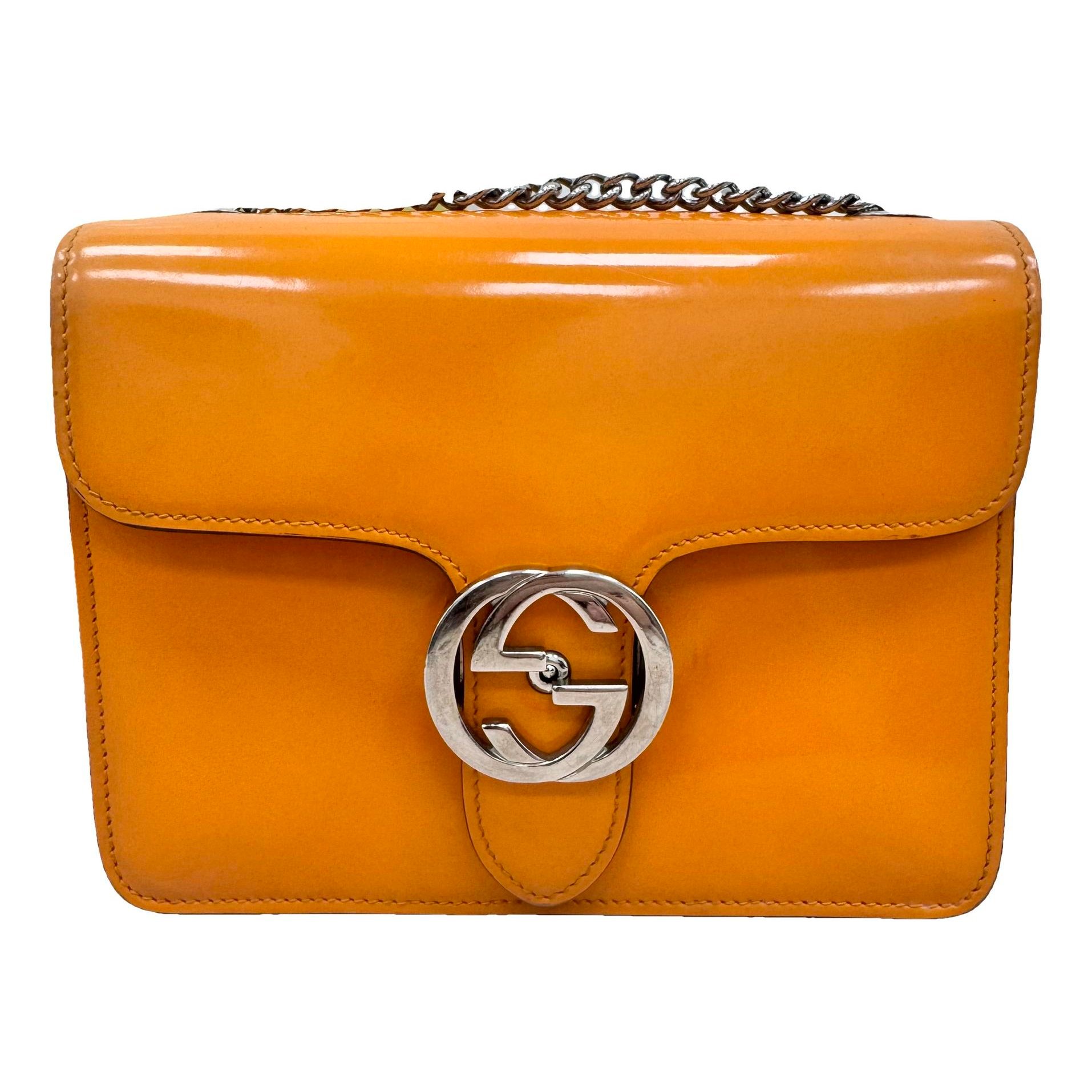 Interlocking patent leather handbag