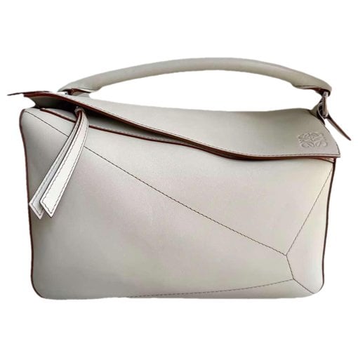 Puzzle leather handbag