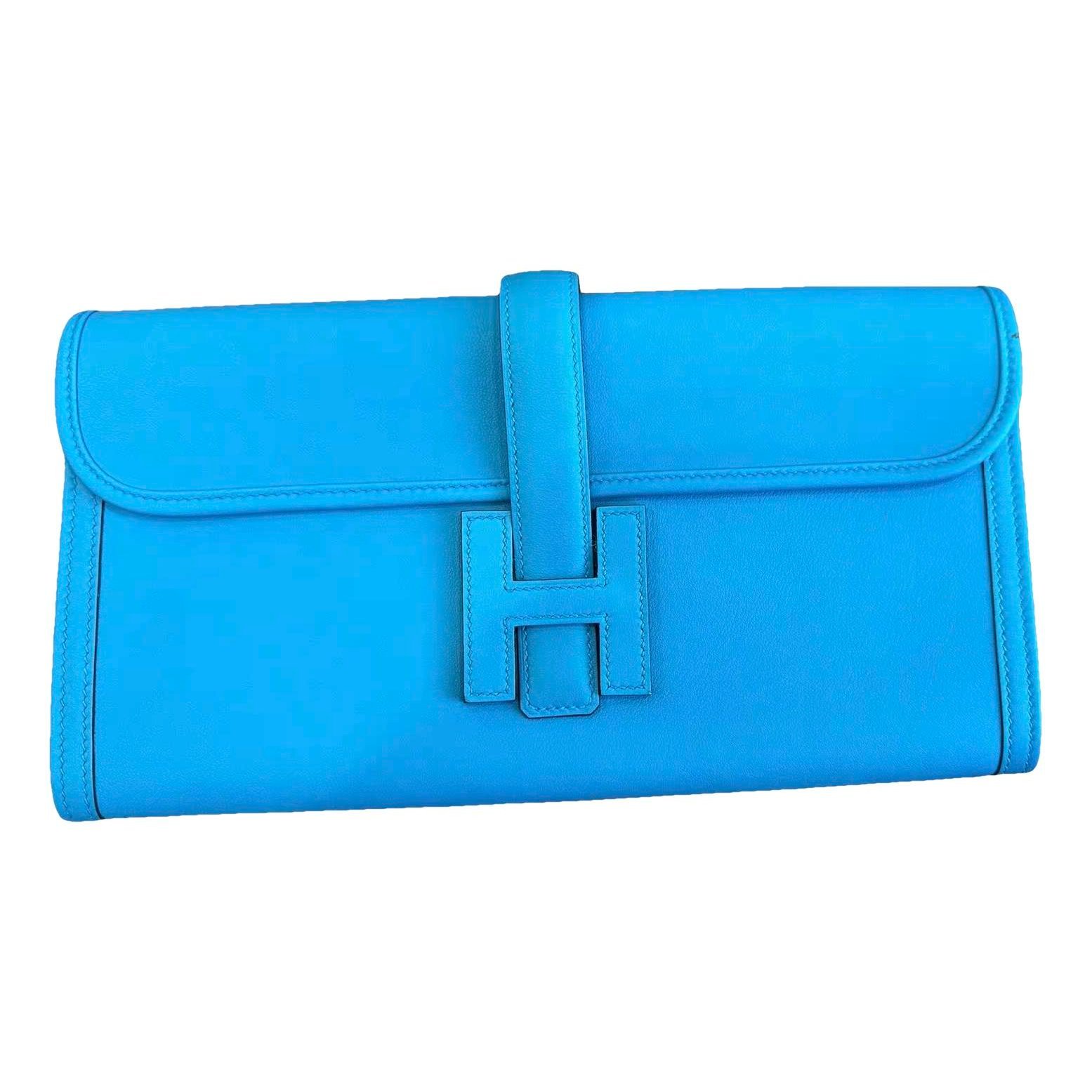 Jige leather clutch bag