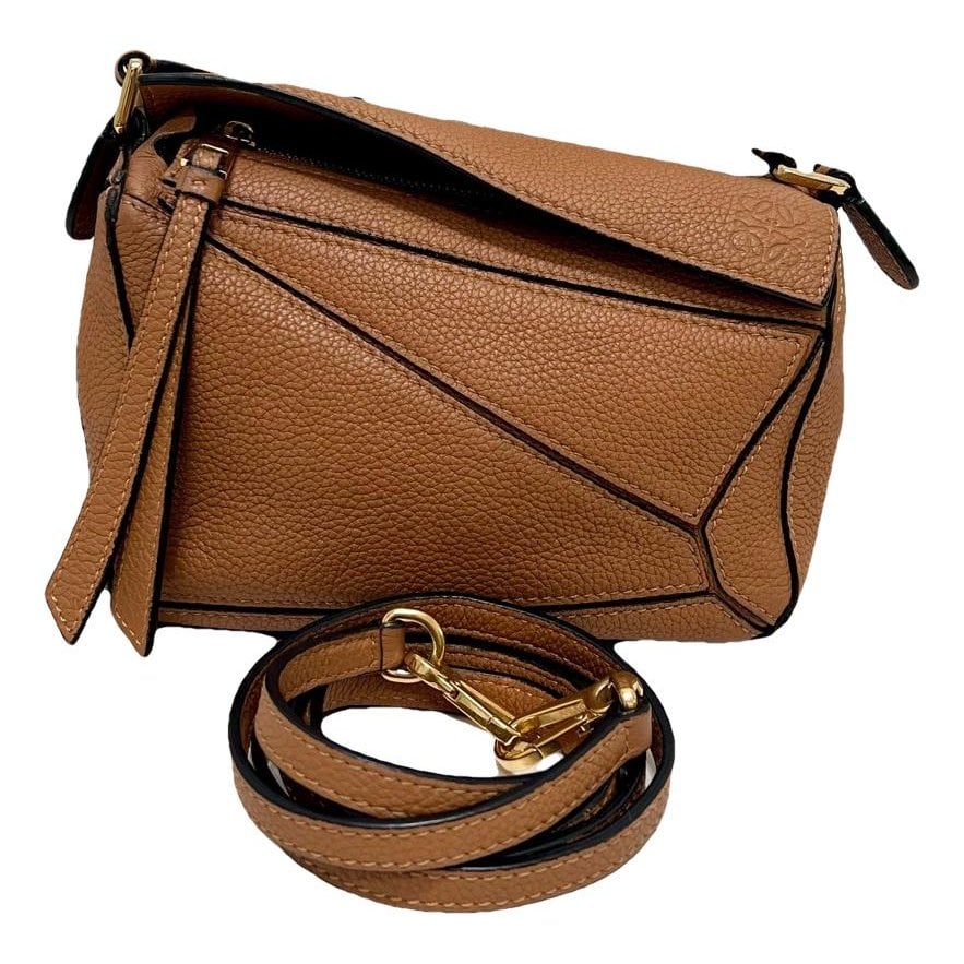 Puzzle leather handbag