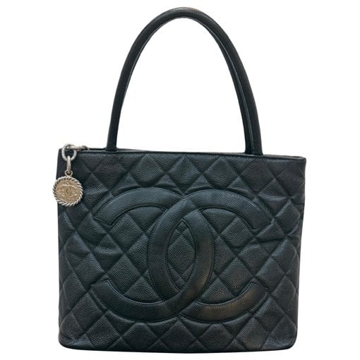 Médaillon leather handbag