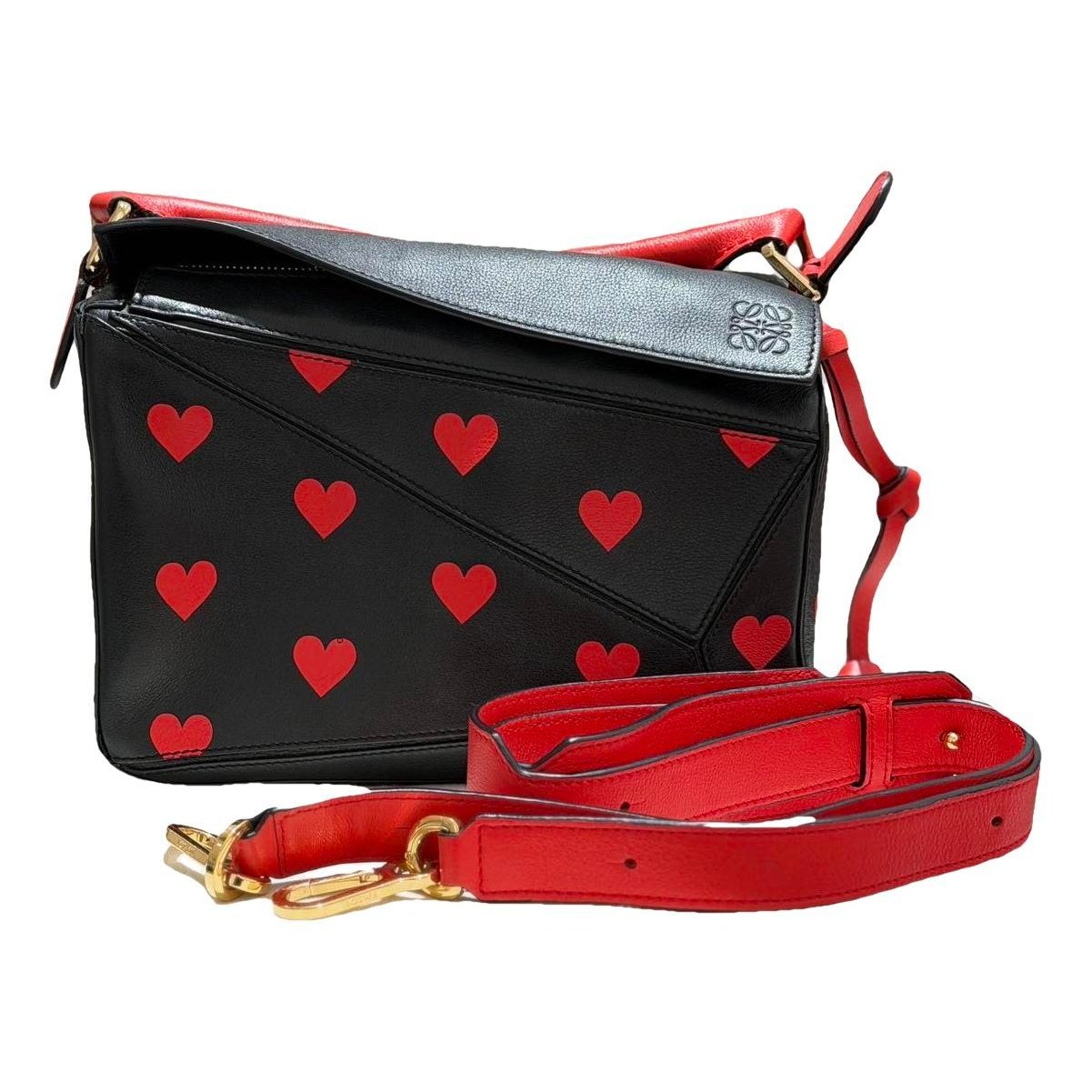 Puzzle leather handbag