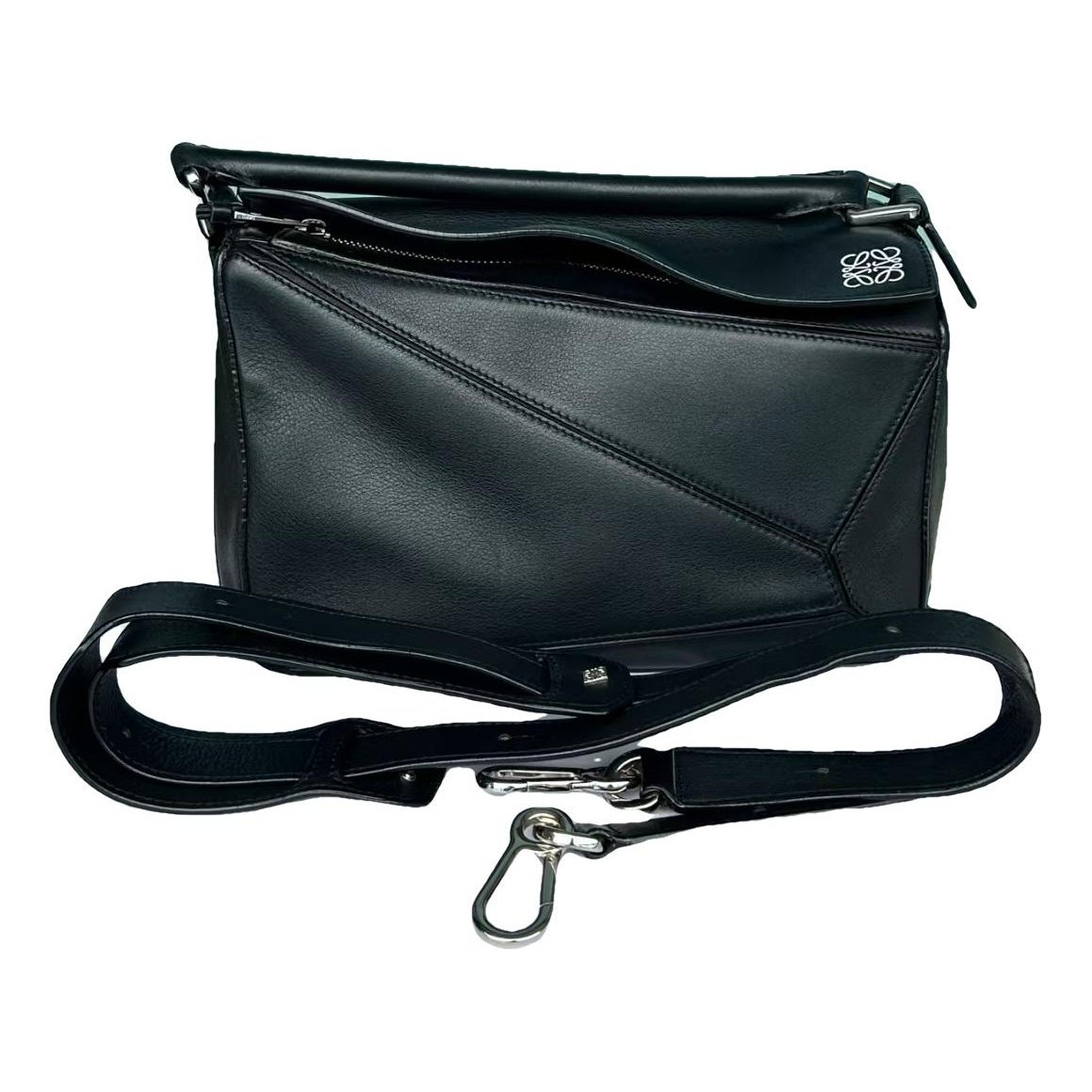 Puzzle leather handbag