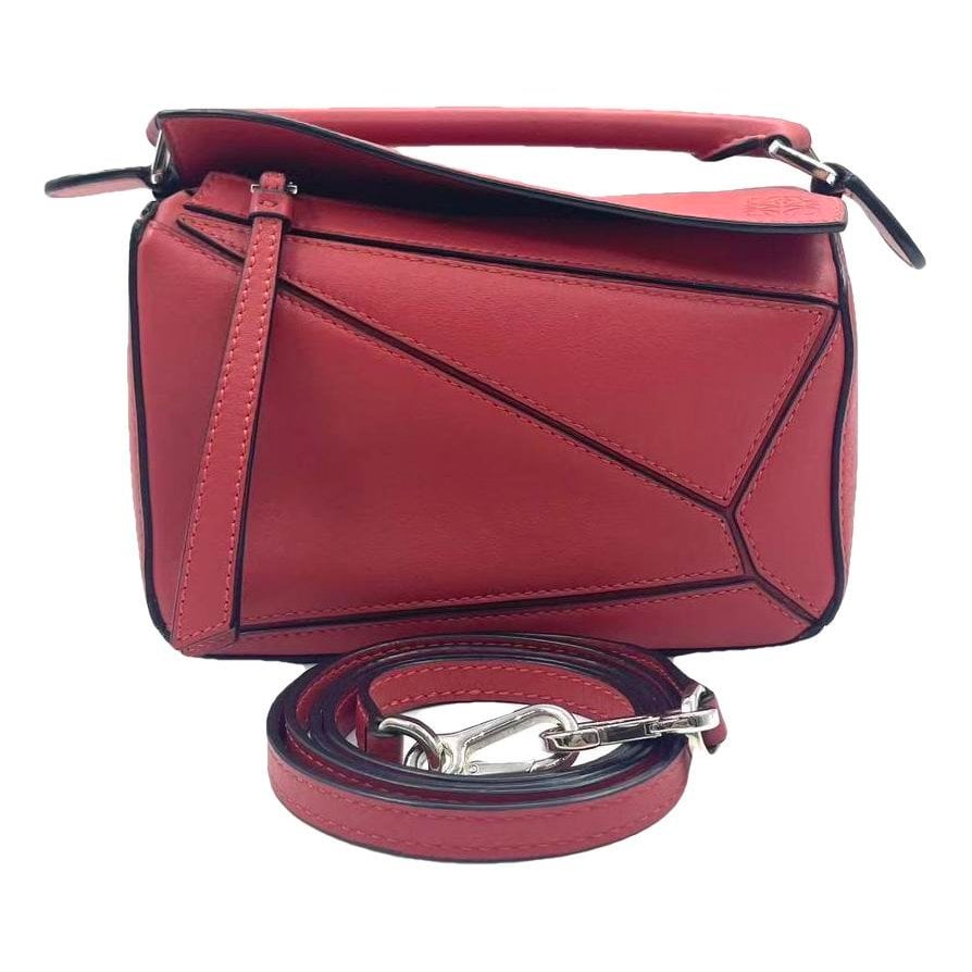 Puzzle leather handbag