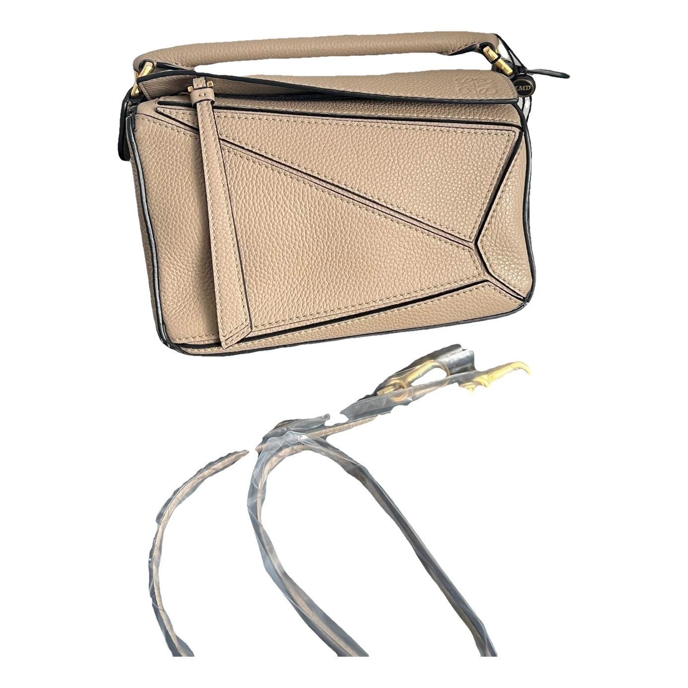 Puzzle leather crossbody bag