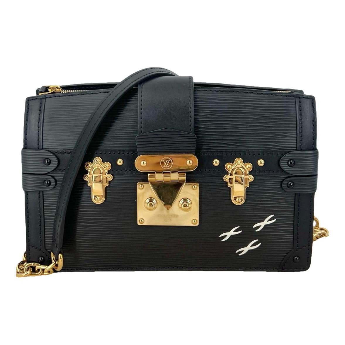 Pochette Trunk leather handbag