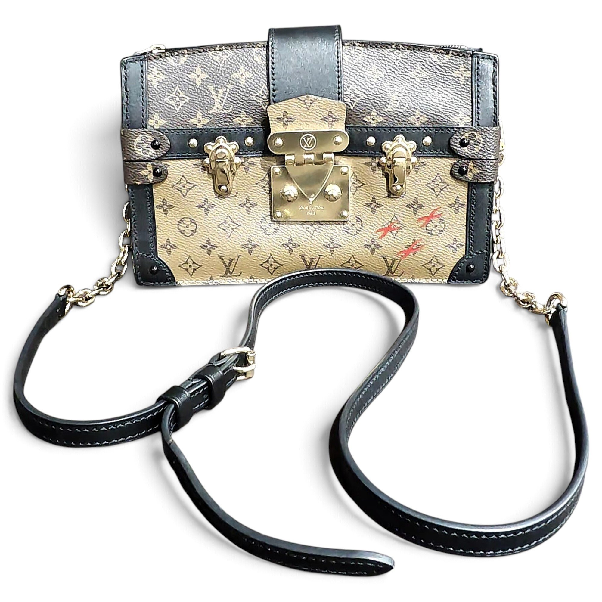 Pochette Trunk leather handbag