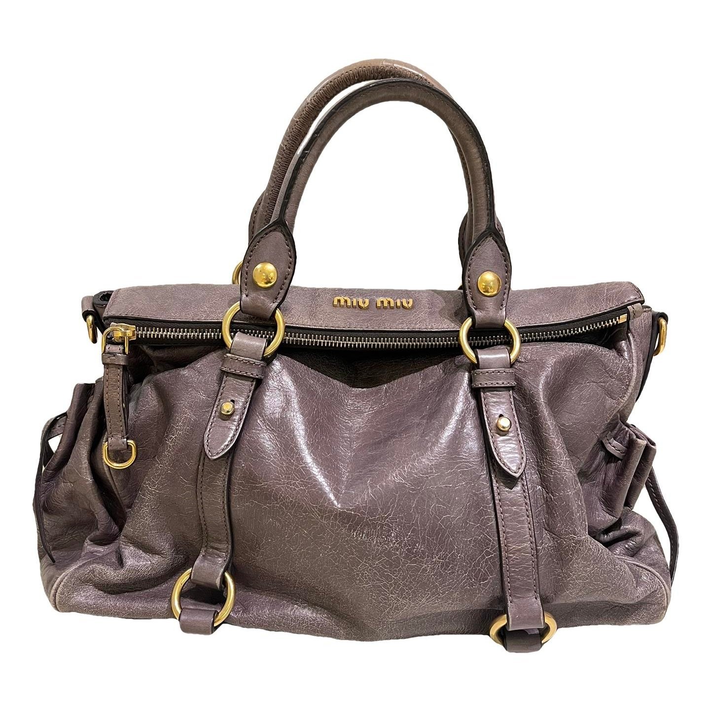 Bow bag leather handbag