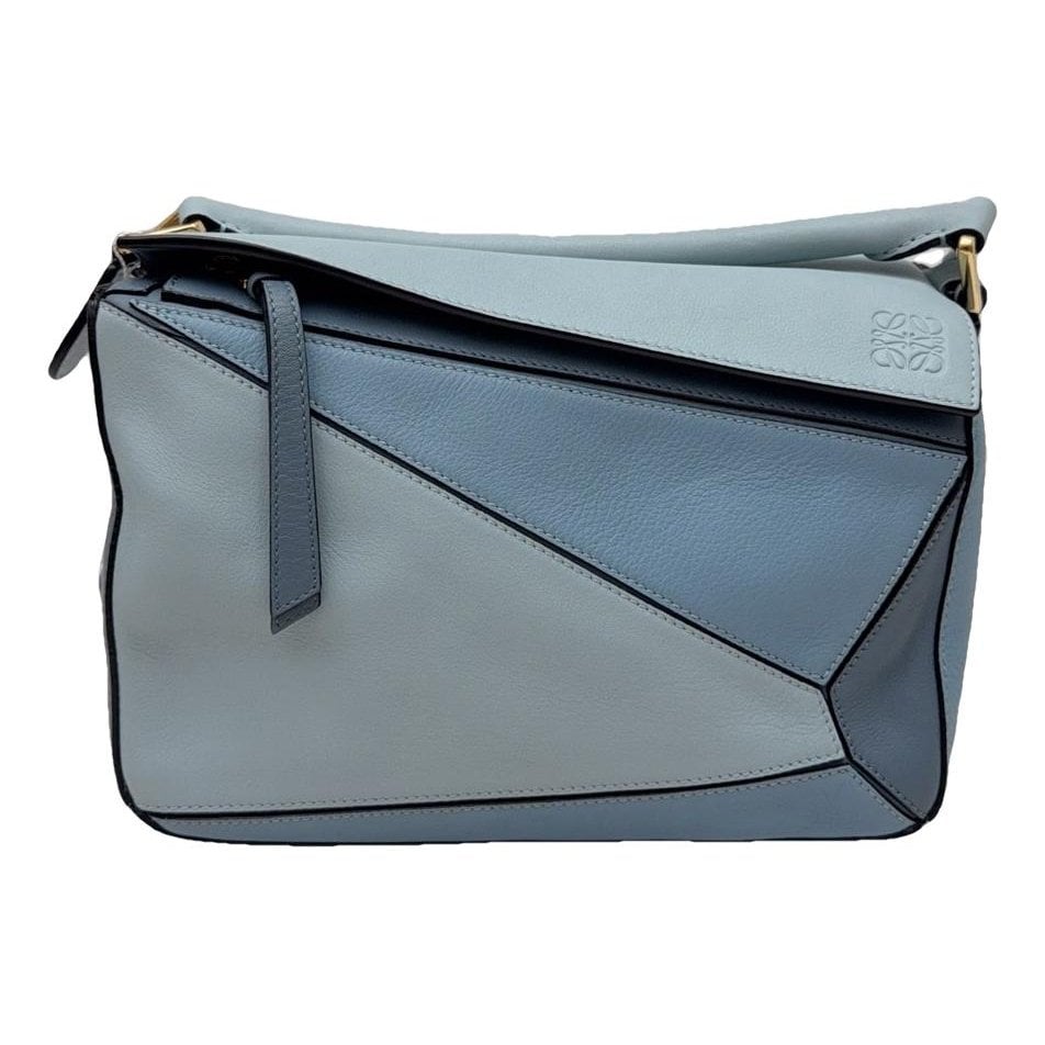 Puzzle leather handbag