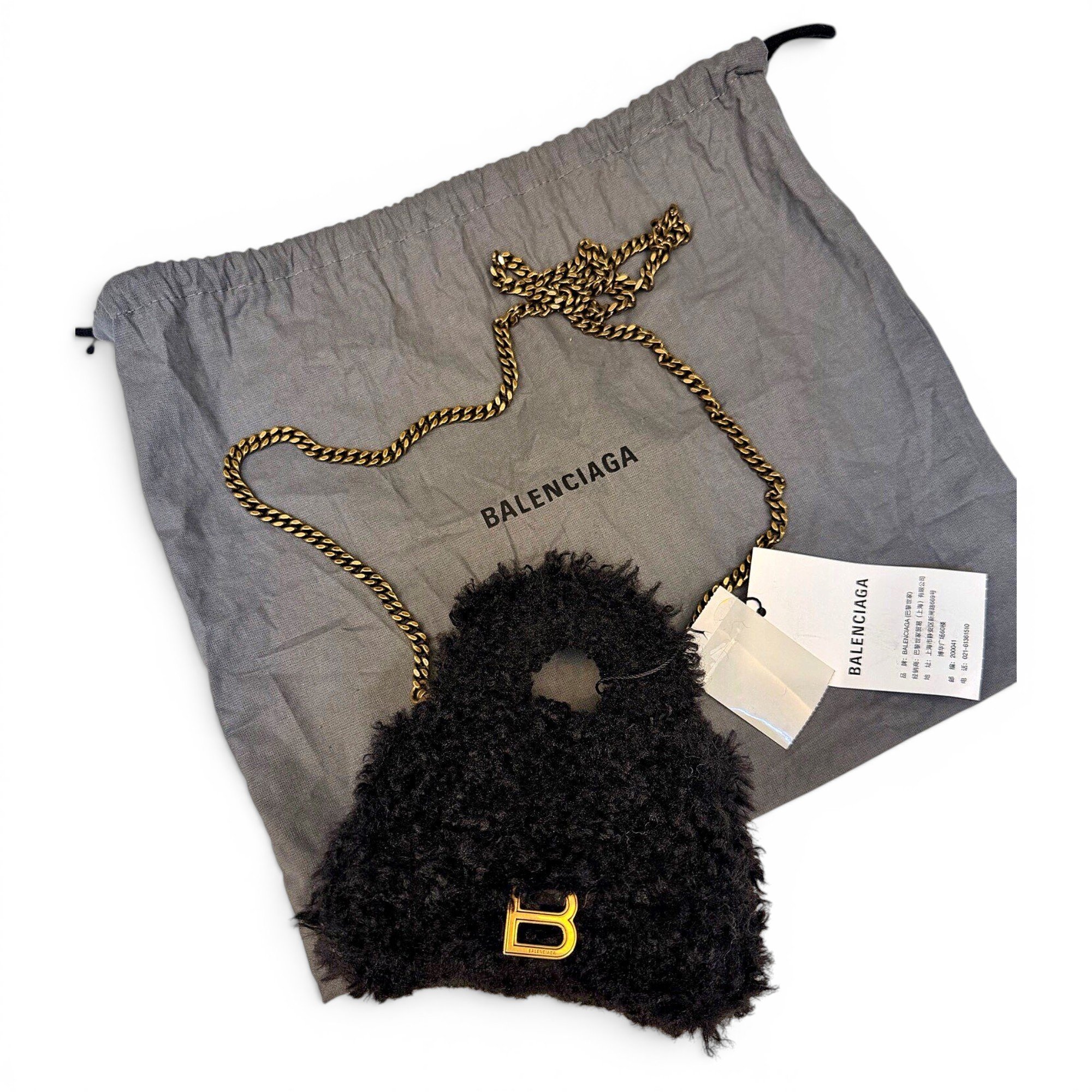 Hourglass faux fur mini bag
