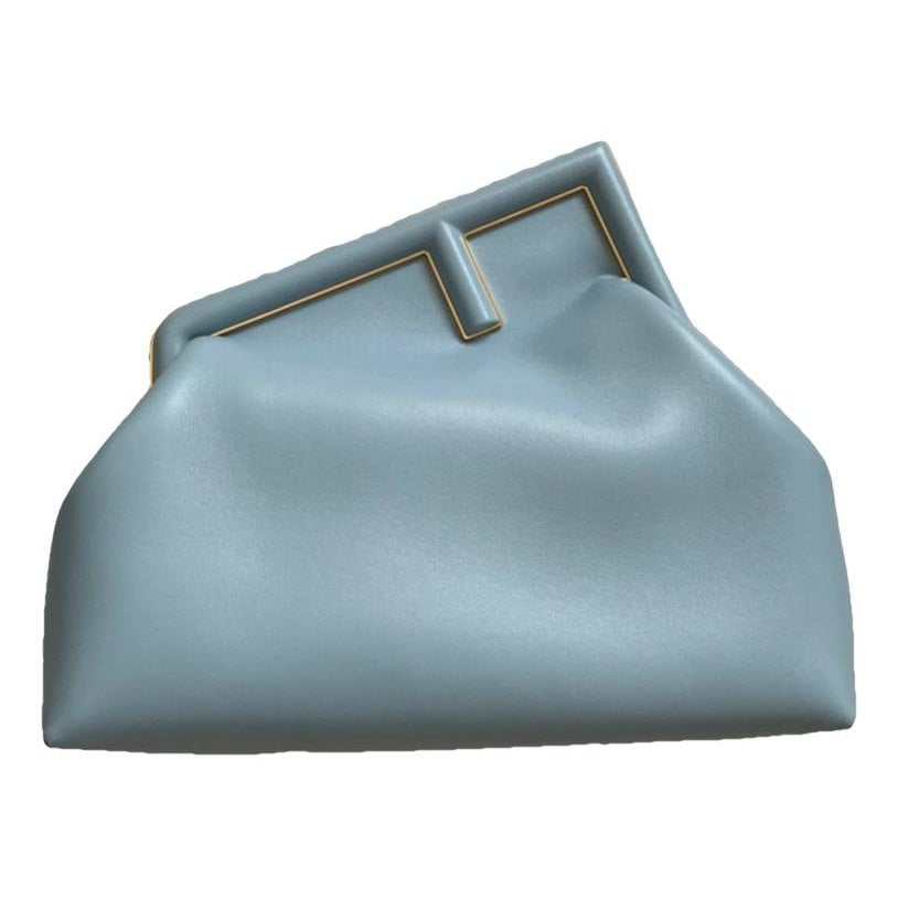First leather handbag