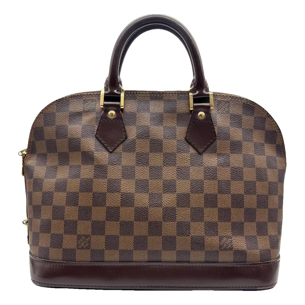 Louis Vuitton Alma leather handbag