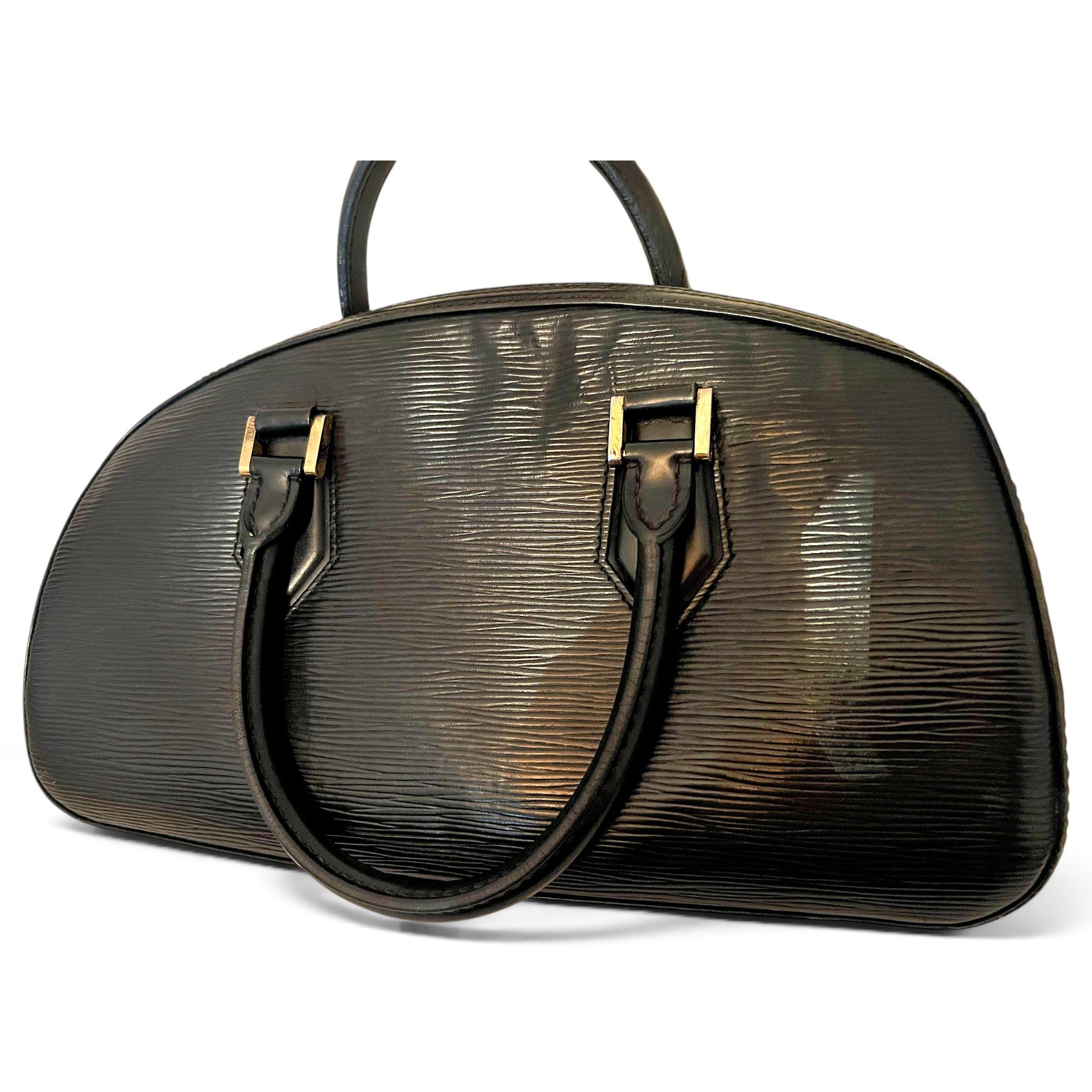 Louis Vuitton Alma Long leather handbag