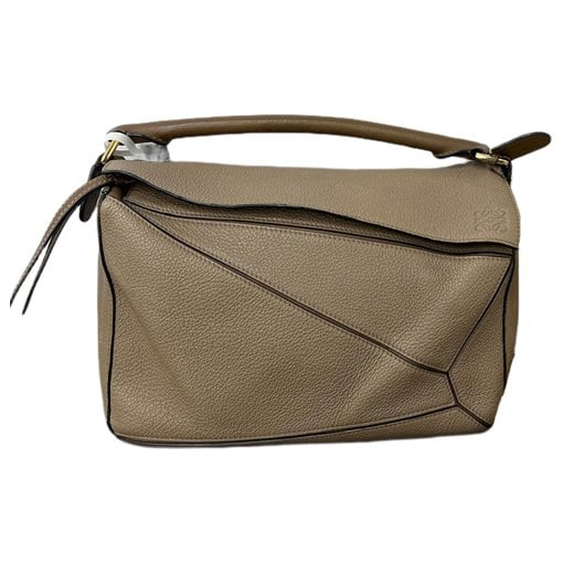 Puzzle leather handbag