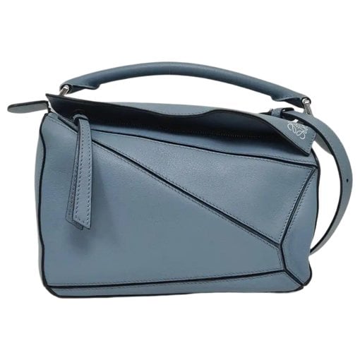 Puzzle leather handbag