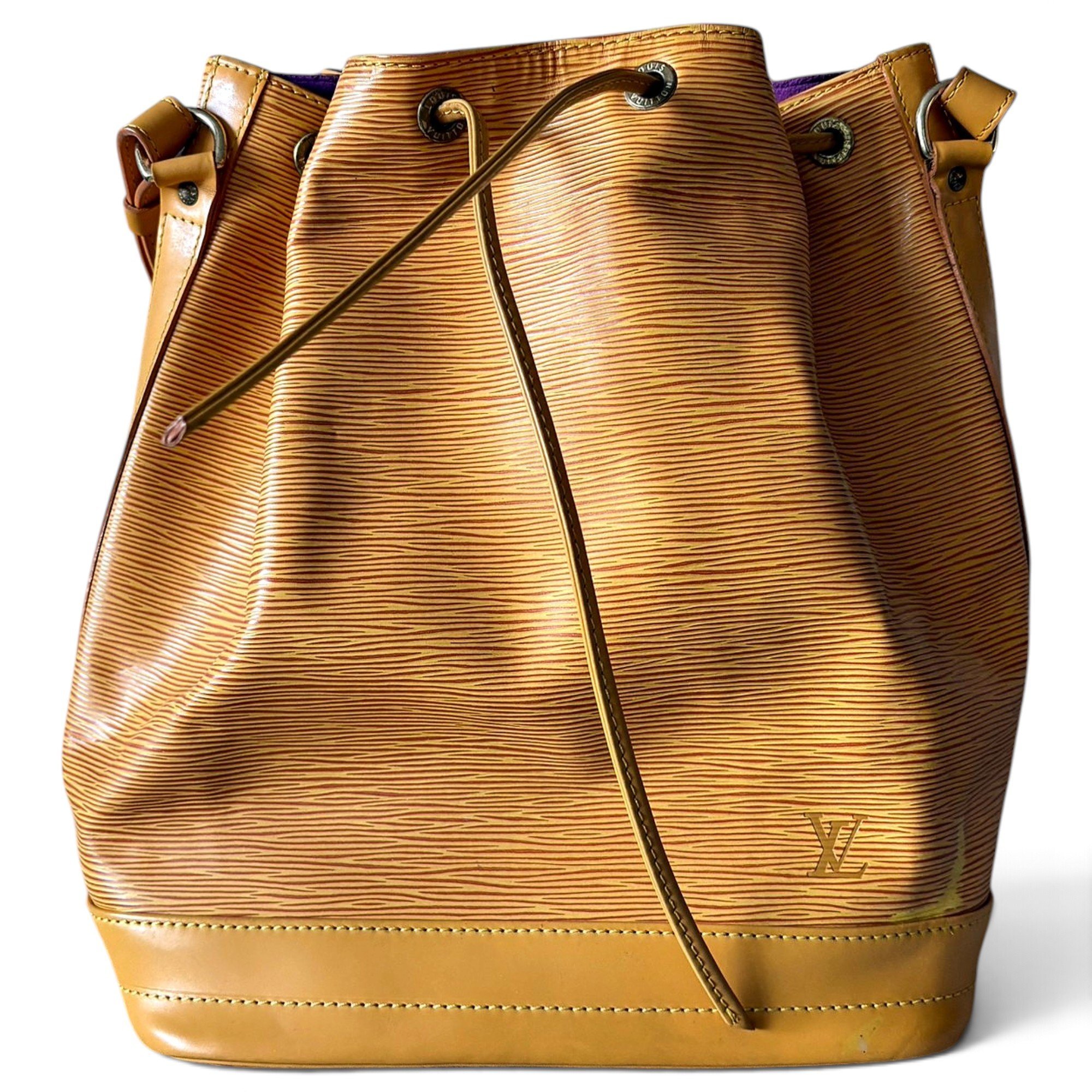 Louis Vuitton Noe leather clutch bag