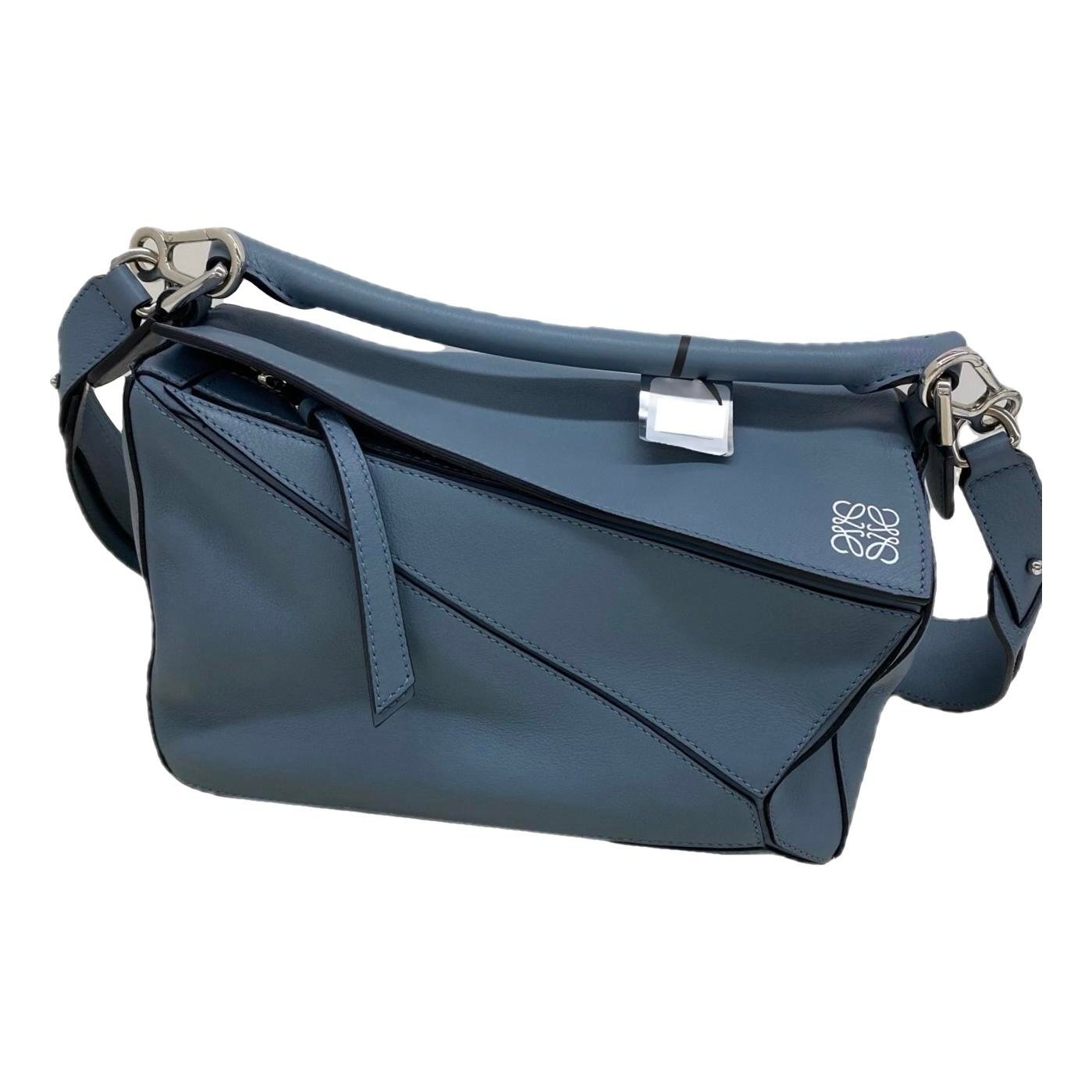 Puzzle leather handbag