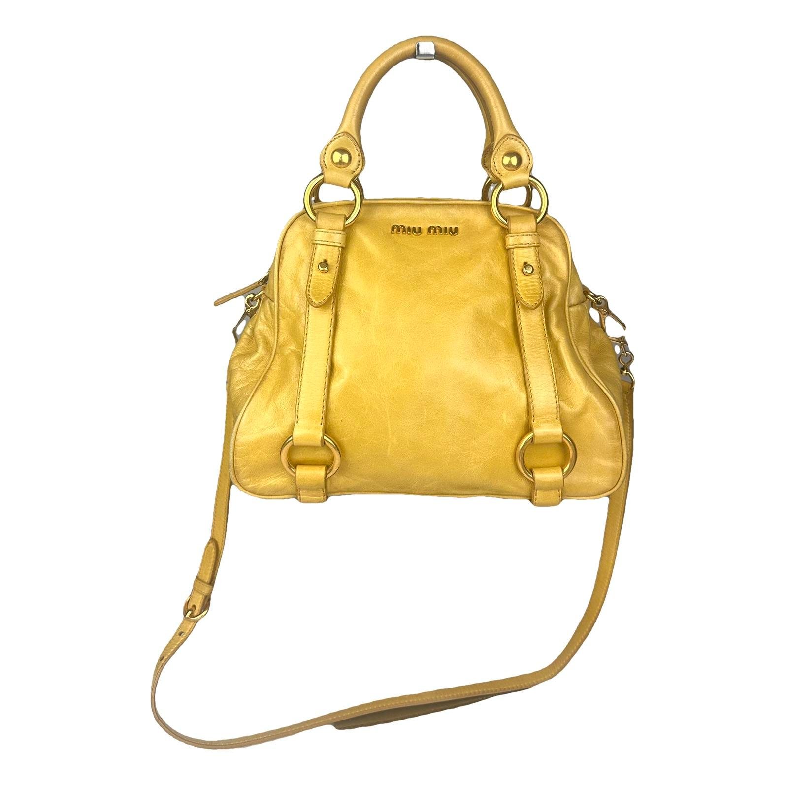 Bow bag leather handbag