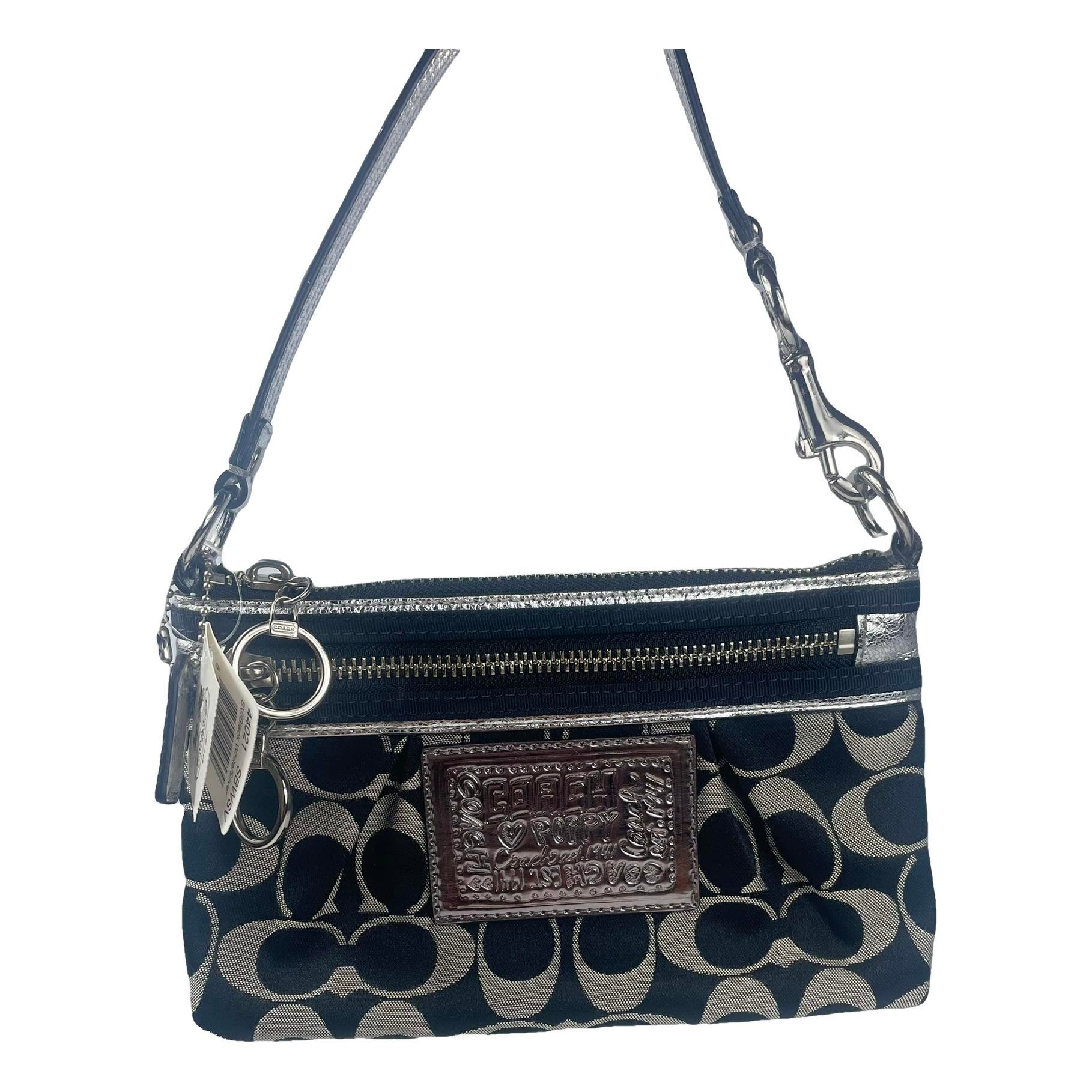 Signature Sufflette cloth clutch bag