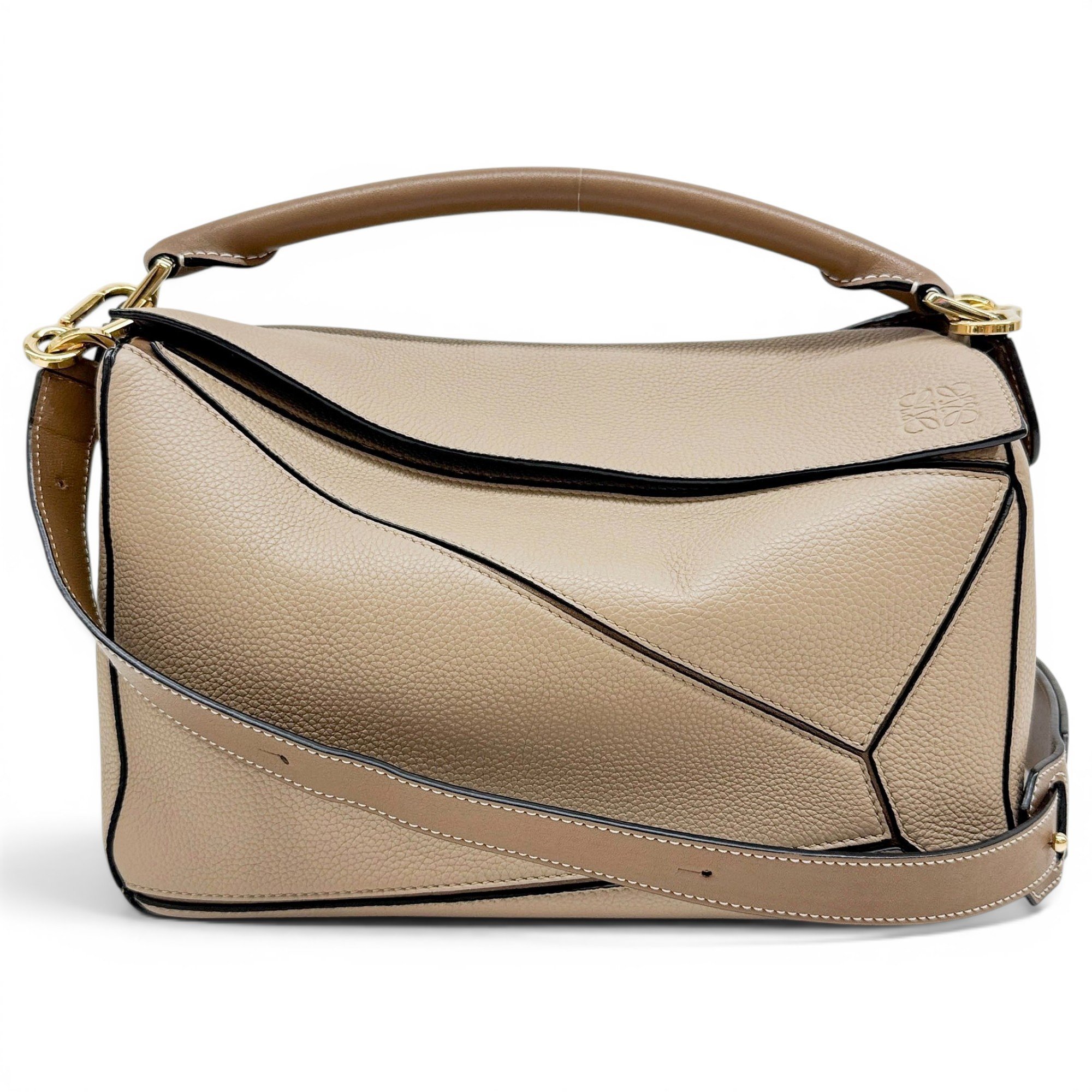 Puzzle leather handbag
