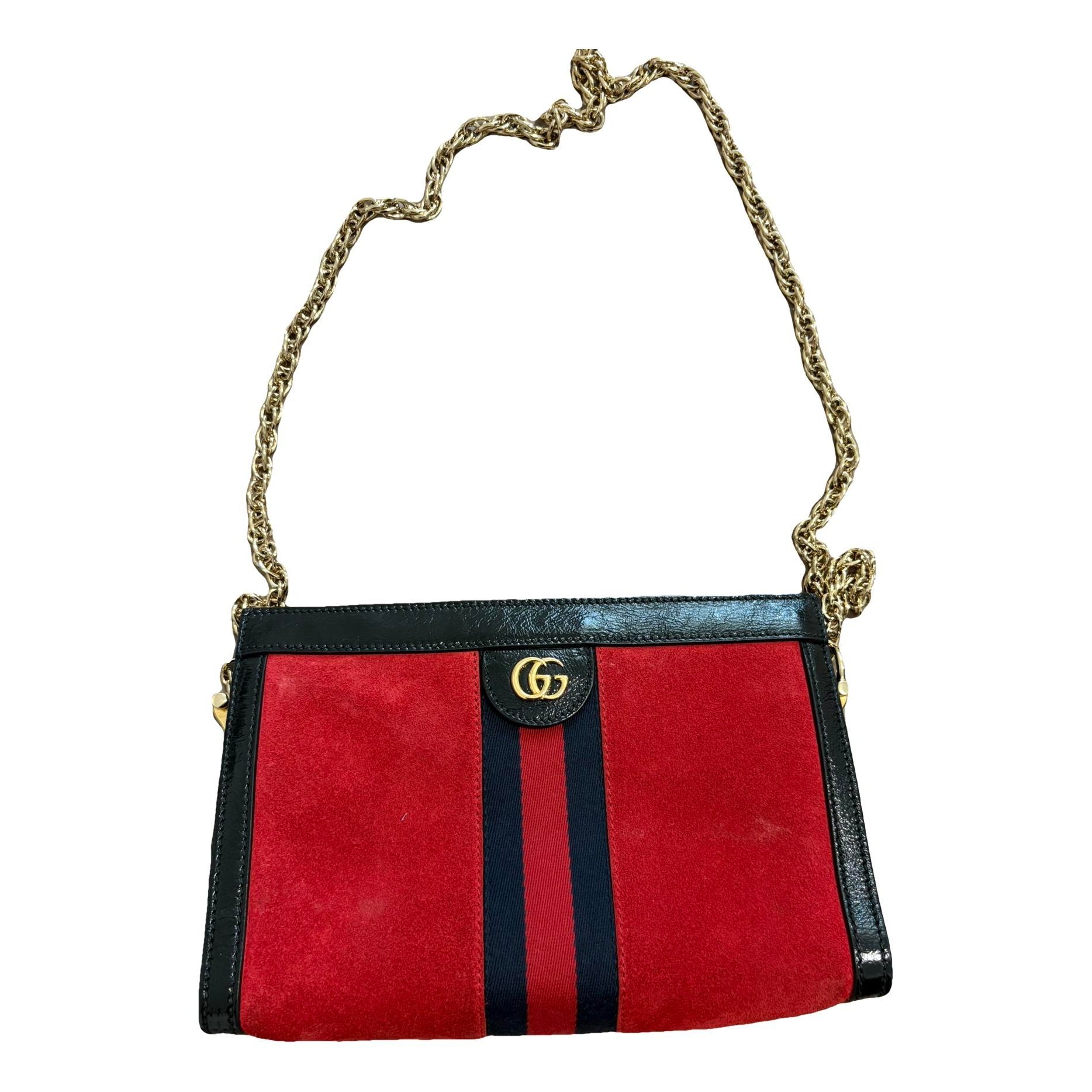Ophidia leather clutch bag