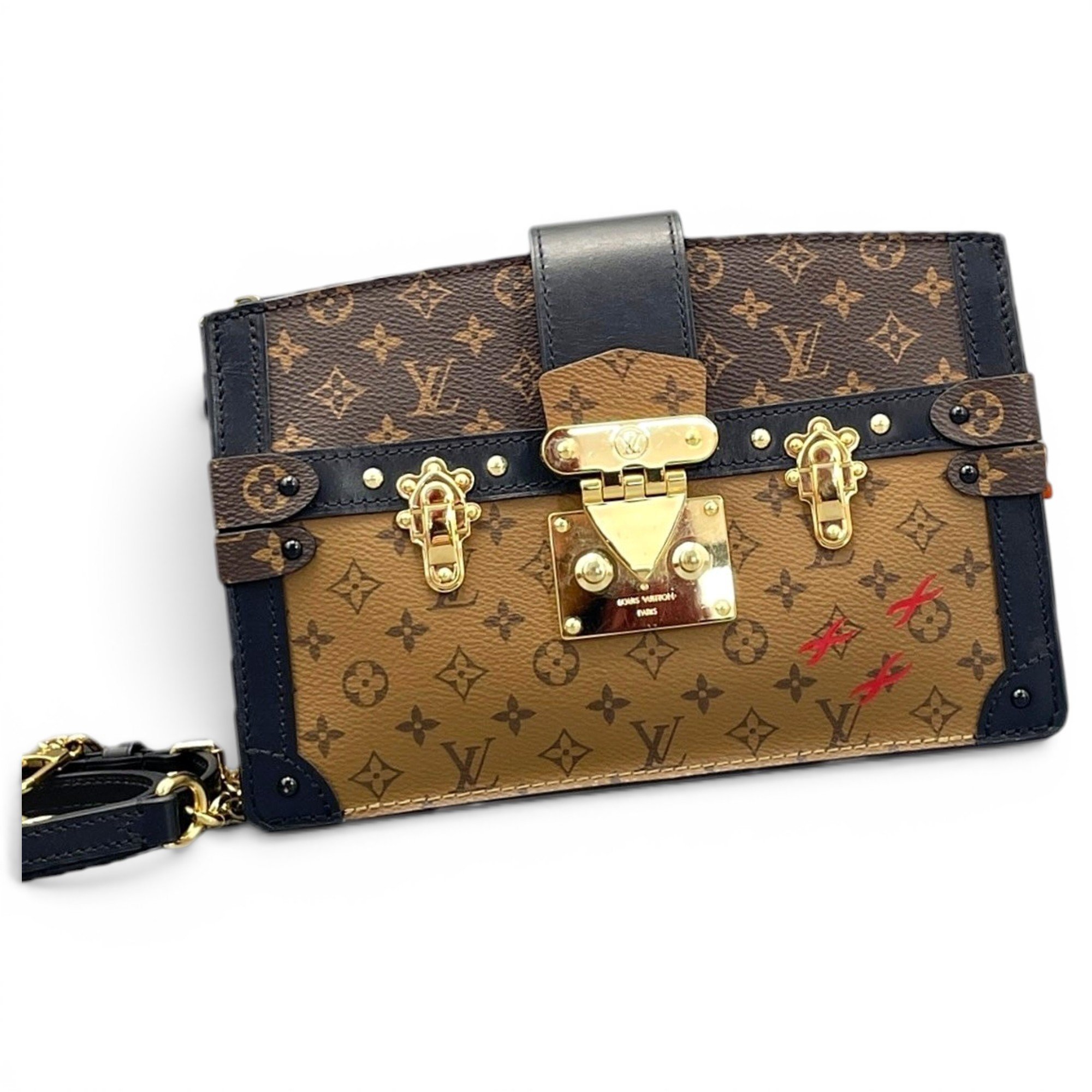 Pochette Trunk leather handbag