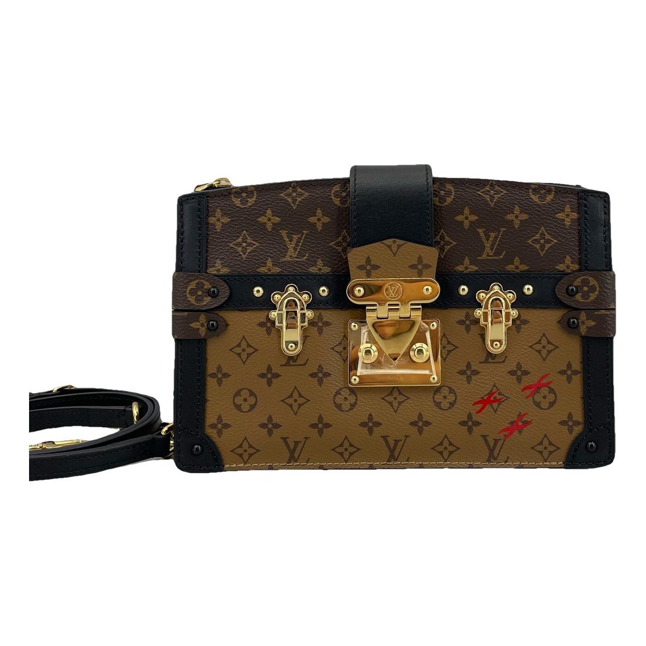 Pochette Trunk leather handbag