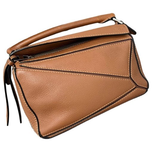 Puzzle leather handbag