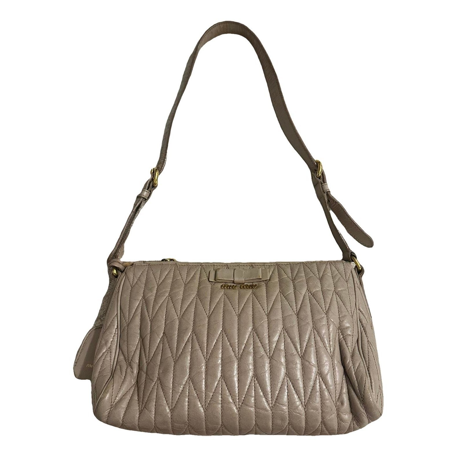 Bow bag leather handbag