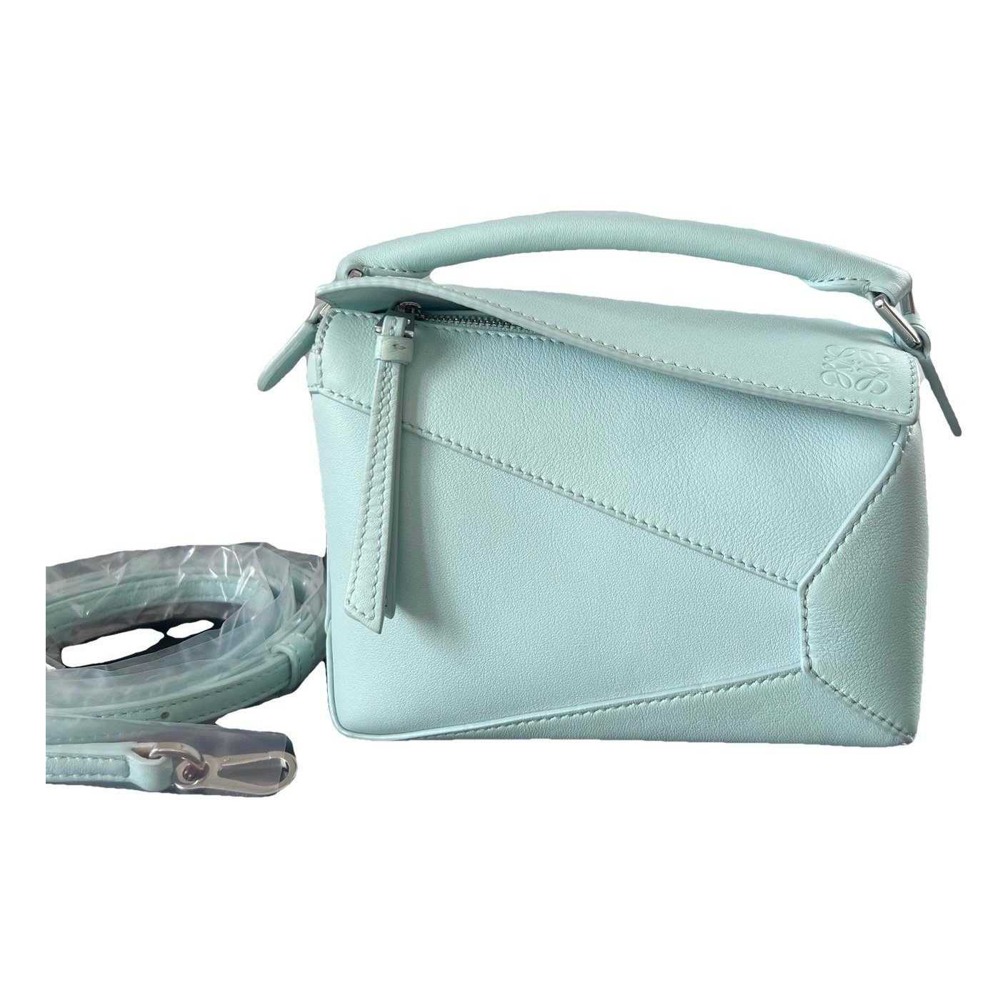 Puzzle leather handbag