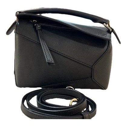 Puzzle leather handbag