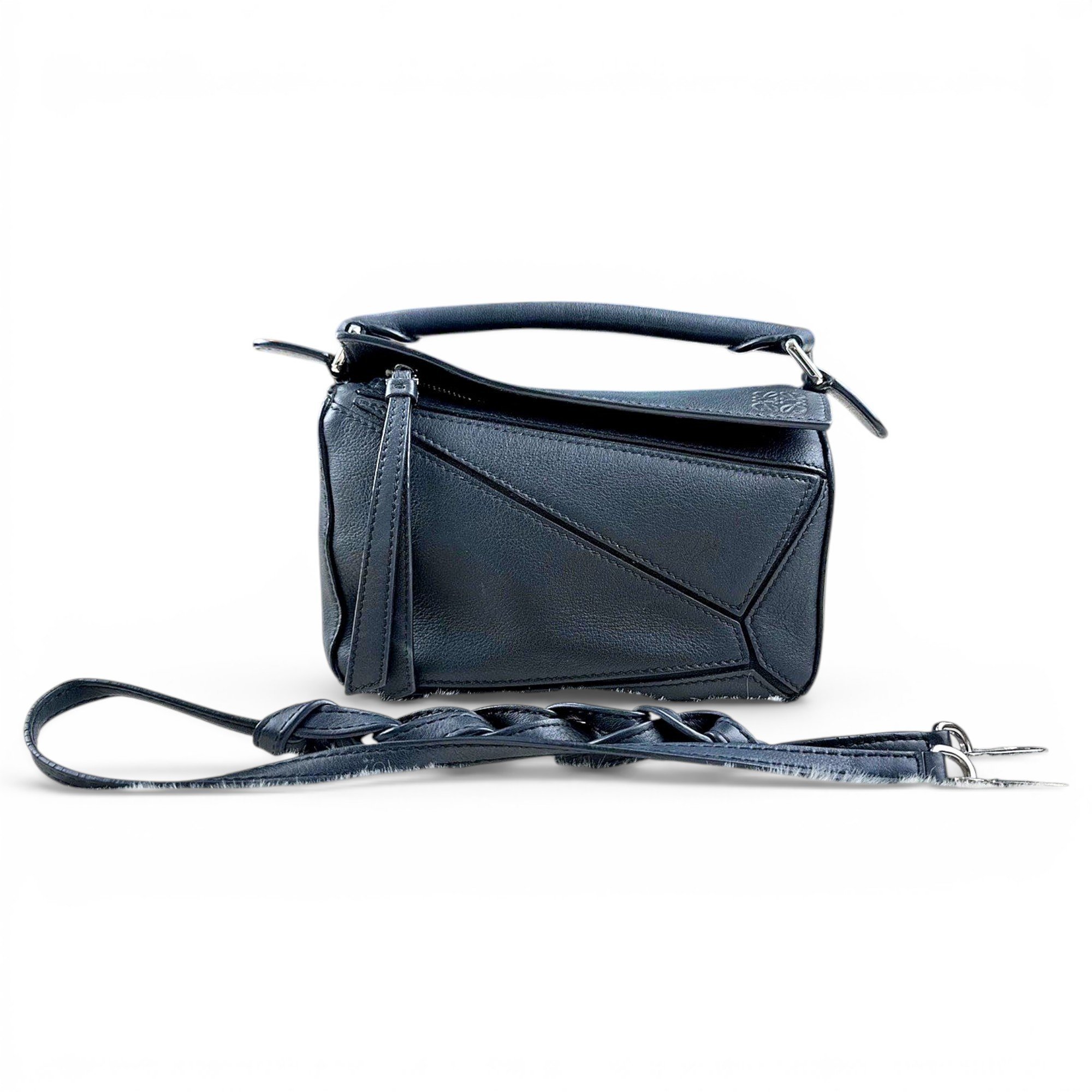 Puzzle leather handbag