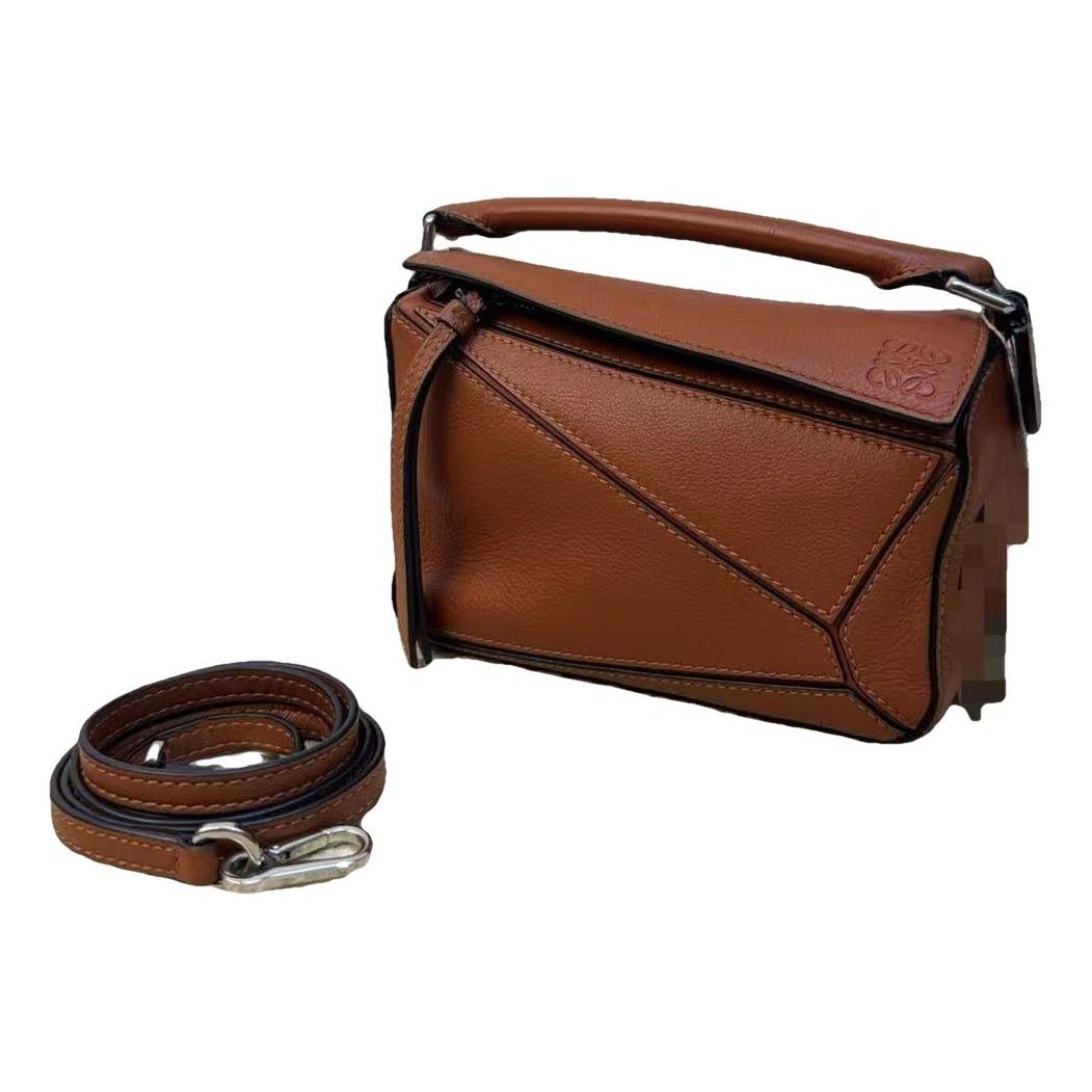Puzzle leather handbag