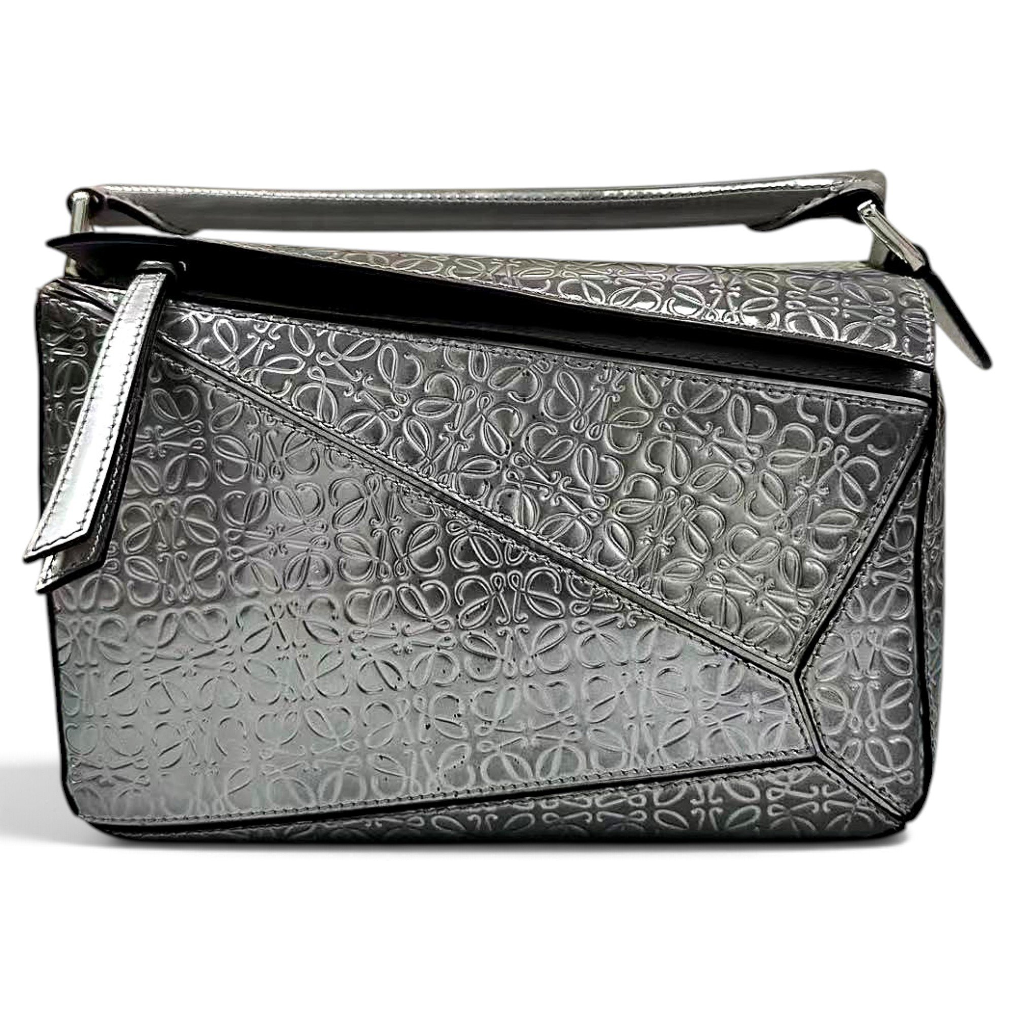 Puzzle patent leather handbag