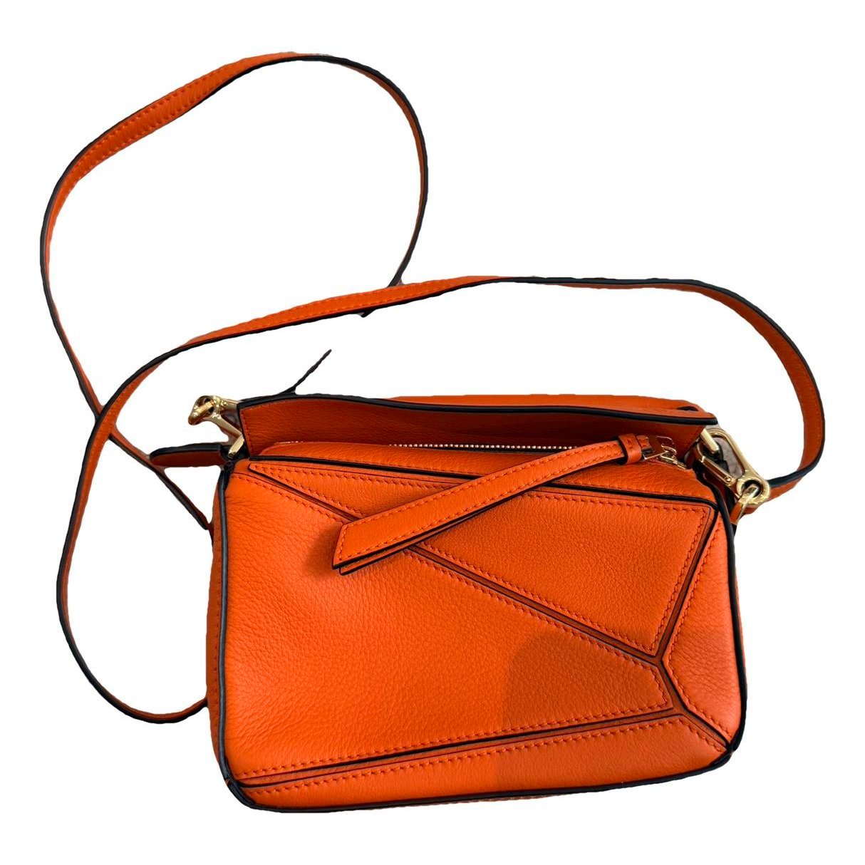 Puzzle leather handbag